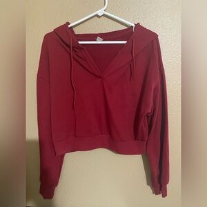 Womens vibrant red cropped pullover hoodie. Size medium